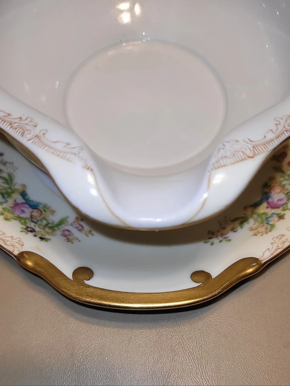 Mieto Porcelain Hand Painted Gravy Boat with Attached Saucer.